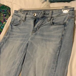 Ripped light blue jeans AMERICAN EAGLE